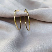 Medium hammered gold hoops