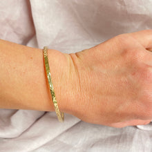 Load image into Gallery viewer, Thick gold hammered bangle
